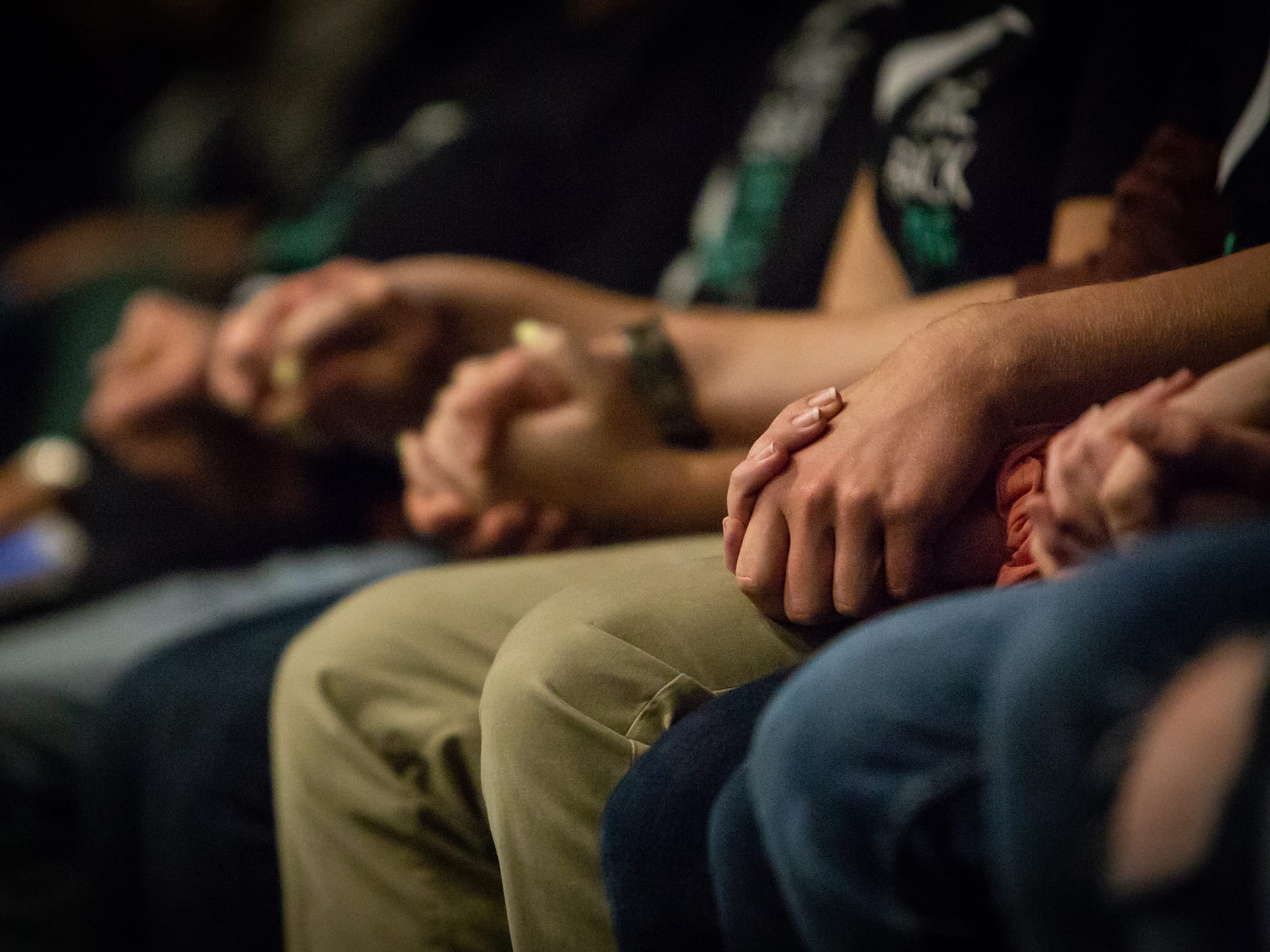 Students link hands at this year's Take Back the Night event. 