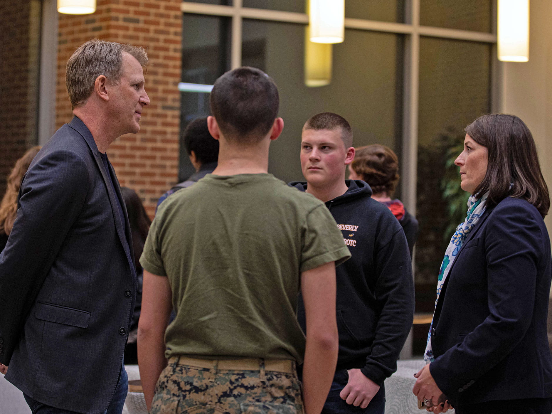 Cybersecurity experts collaborating with students and faculty