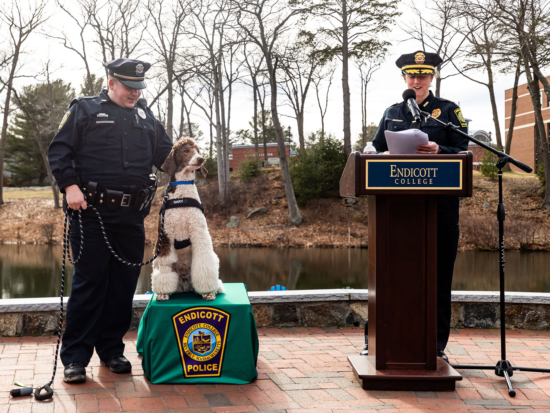 Officer Elliot Lanciani and Chief of Police Kerry Ramsdell with Gary