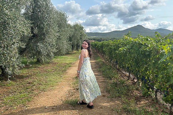 Bella Dowd ’25 is passionate about making the fashion industry more sustainable by leaning into crafting unique vintage looks. 