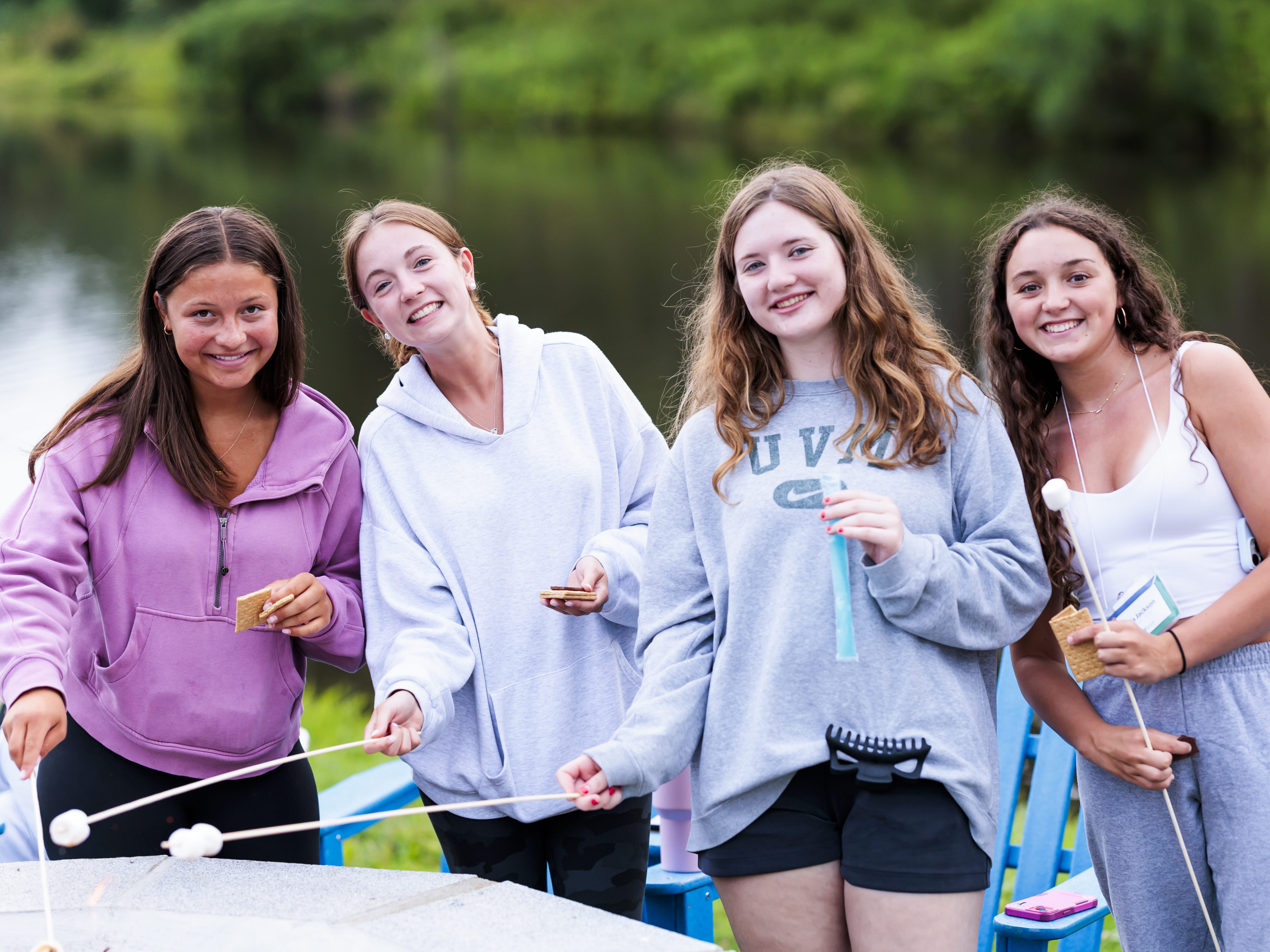 Students roasting marshmellows