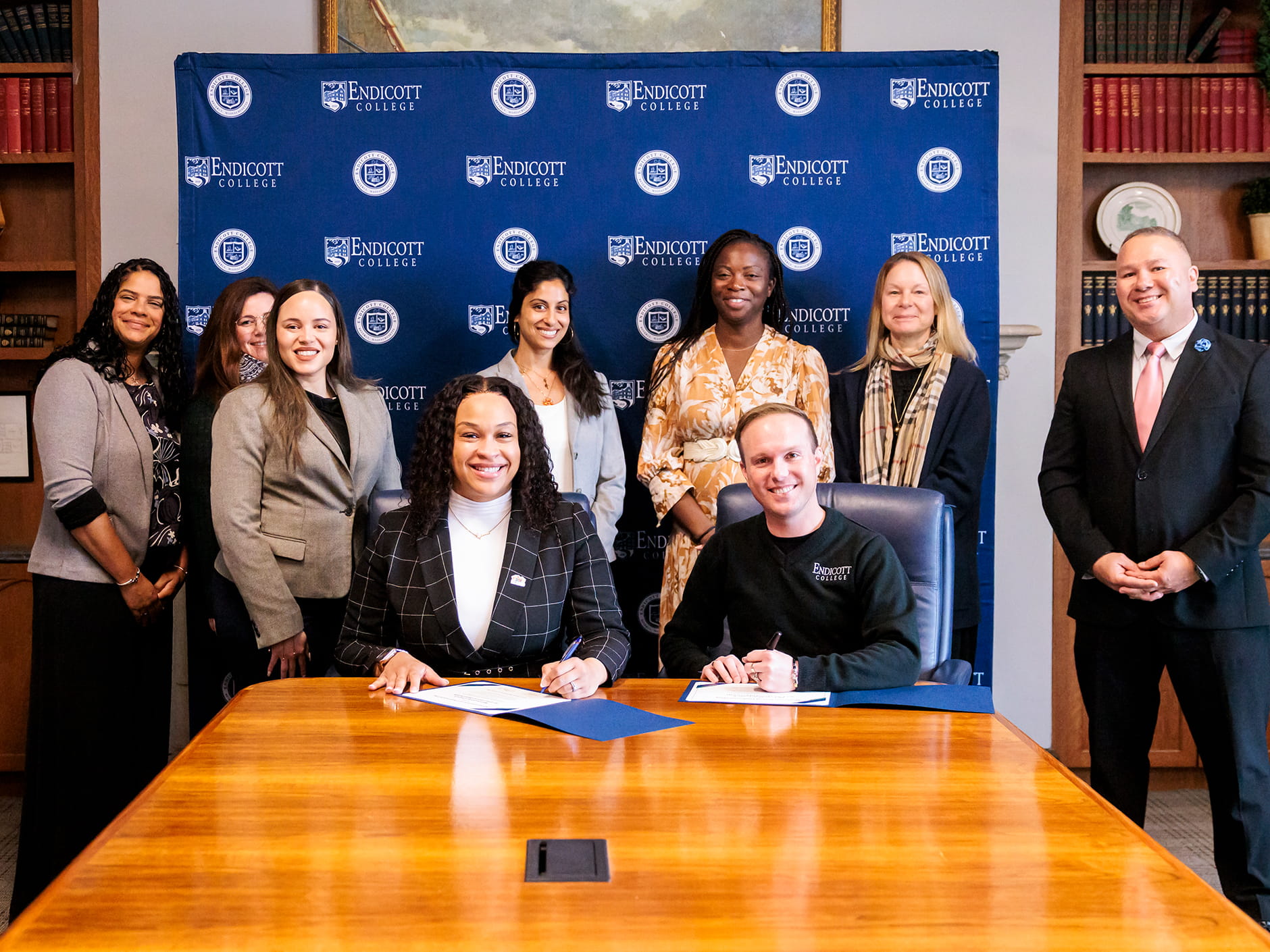 President Bryan Cain signs a partnership with METCO. Endicott College expands financial literacy education through a new partnership with the Metropolitan Council for Educational Opportunity (METCO), offering high school students the opportunity to earn college credit through its BUS212 Personal Finance course.