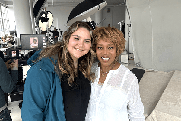 Jaedyn Shock ’27 smiles with actress Alfre Woodard.