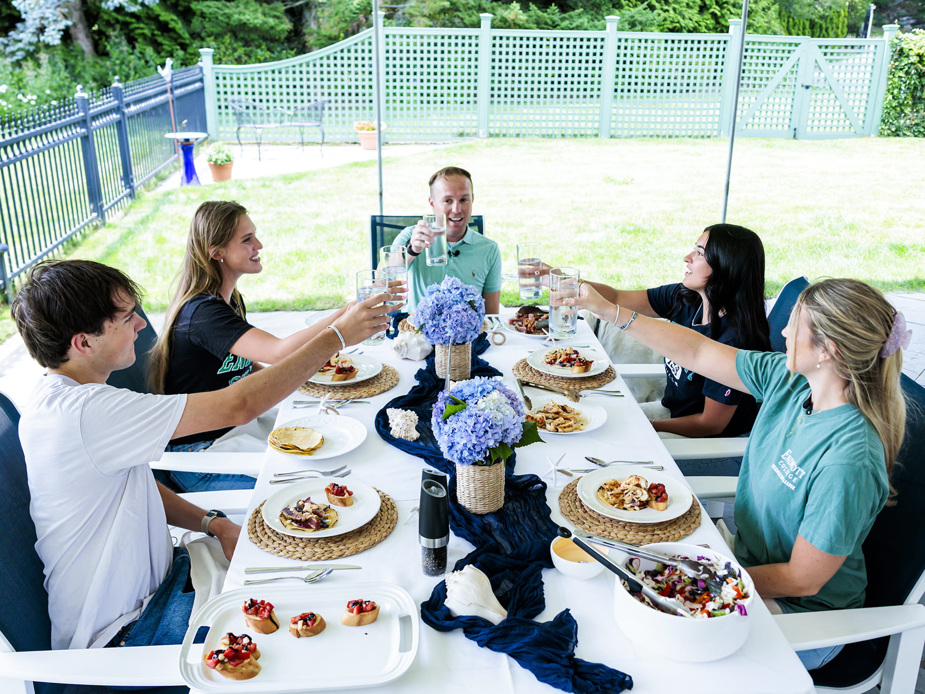 Endicott College students join President Bryan Cain, Ph.D., for a farm-to-table lunch.
