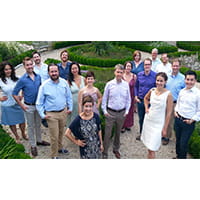 a group of people standing together for a photo