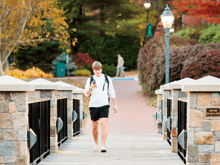 Student walking through campus