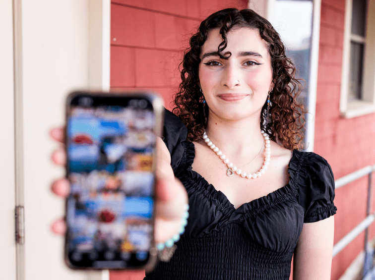 Student holding a phone