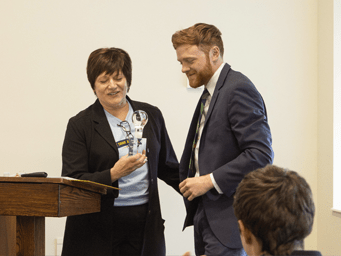 Student and faculty in class