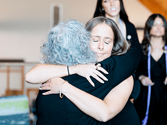 People hugging each other