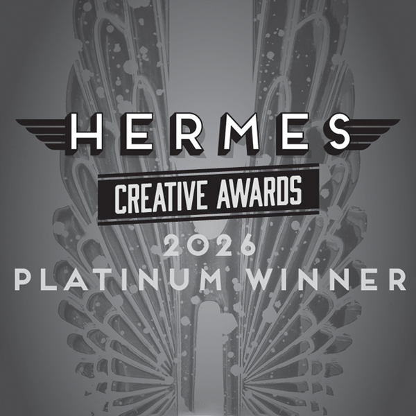 Hermes Creative Awards 2026 Platinum Winner logo featuring stylized wings in the background.