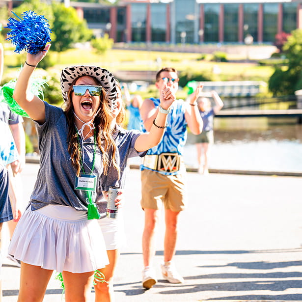 Excited students cheering on campus